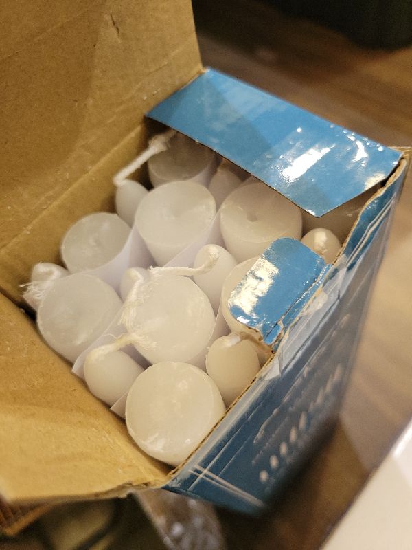 Photo 1 of 20 Pack White Taper Candles, 10 Hours Burn Time, Unscented, Smokeless and Dripless, 0.8 x 12 Inch Dinner Candle Set for Household, Wedding, Party and Home Décor Candlesticks