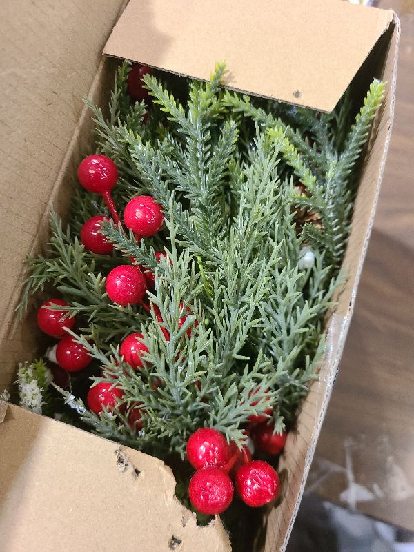 Photo 1 of [Snowy] 4 Pcs Christmas Candle Rings Wreaths, Mini Wreaths - 9"x3.5" Real Touch Cedar Wreath with Cypress Snowy Pinecones & Red Berry Christmas Candle Ring Holder for Home Table Centerpiece Decor