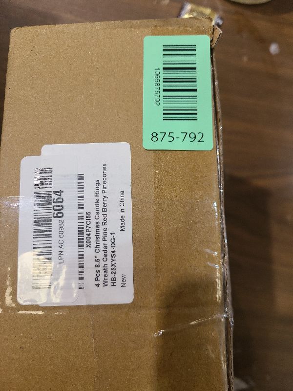 Photo 1 of [Snowy] 4 Pcs Christmas Candle Rings Wreaths, Mini Wreaths - 9"x3.5" Real Touch Cedar Wreath with Cypress Snowy Pinecones & Red Berry Christmas Candle Ring Holder for Home Table Centerpiece Decor