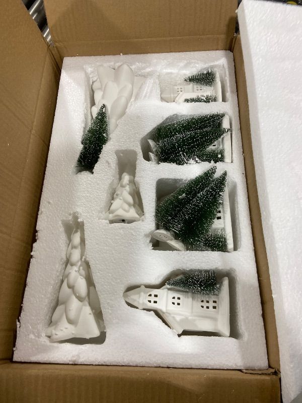 Photo 1 of Newtay 12 Pcs Lighted Ceramic White Christmas Village Houses Set Including 4 Ceramic Christmas Village Houses 3 Porcelain Tree and 5 Sisal Tree for Home Decoration, Winter Holiday DIY, Gift