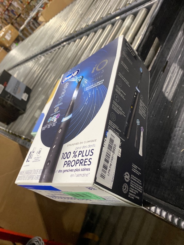 Photo 1 of Oral-B iO Deep Clean + Whiten Rechargeable Electric Toothbrush with Visible Pressure Sensor, 2 Minute Timer, 5 Cleaning Settings, 1 iO5 Limited, 3 Toothbrush Heads, Travel Case & Refill Holder, Black