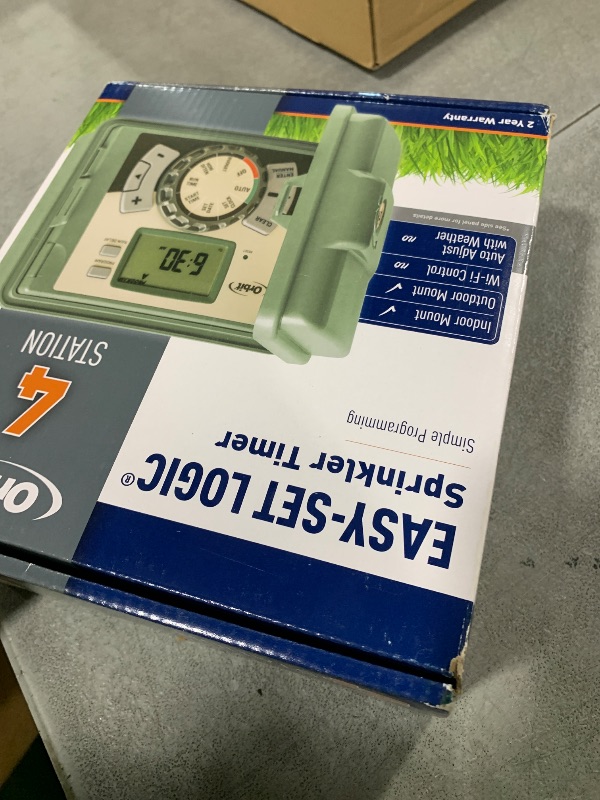 Photo 1 of Orbit 57894 4-Station Outdoor Swing Panel Sprinkler System Timer