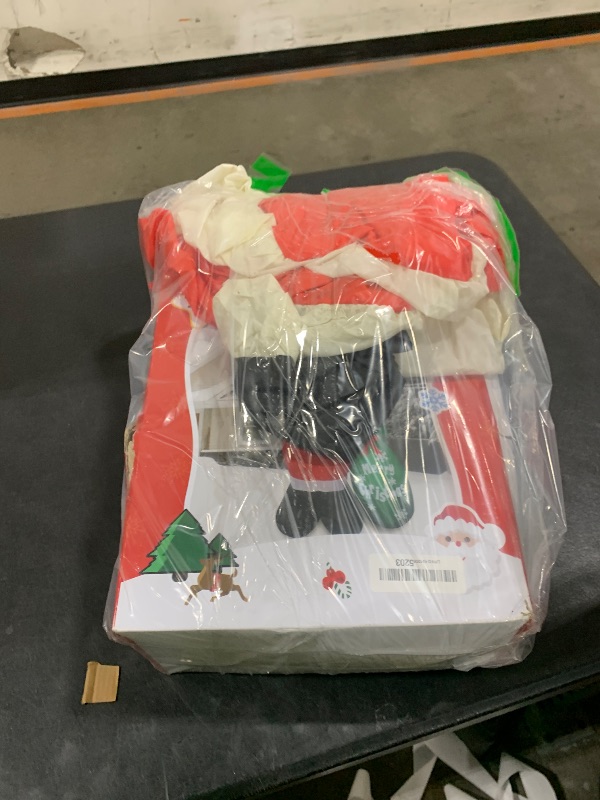 Photo 1 of 10 FT Christmas Inflatable Santa Claus Outdoor Decor for Yard, Giant Blow up Santa Decoration with Big Gift Bag, Built-in LED Lights for Garden Lawn Home Indoor Winter Holiday Party IP44 Weatherproof