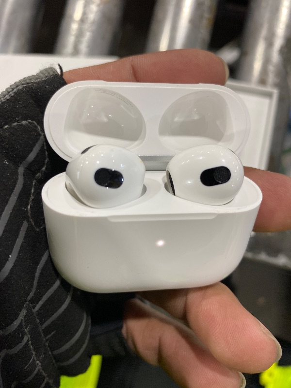 Photo 1 of major damage-------------------Apple AirPods (3rd Generation) Wireless Ear Buds, Bluetooth Headphones, Personalized Spatial Audio, Sweat and Water Resistant, Lightning Charging Case Included, Up to 30 Hours of Battery Life