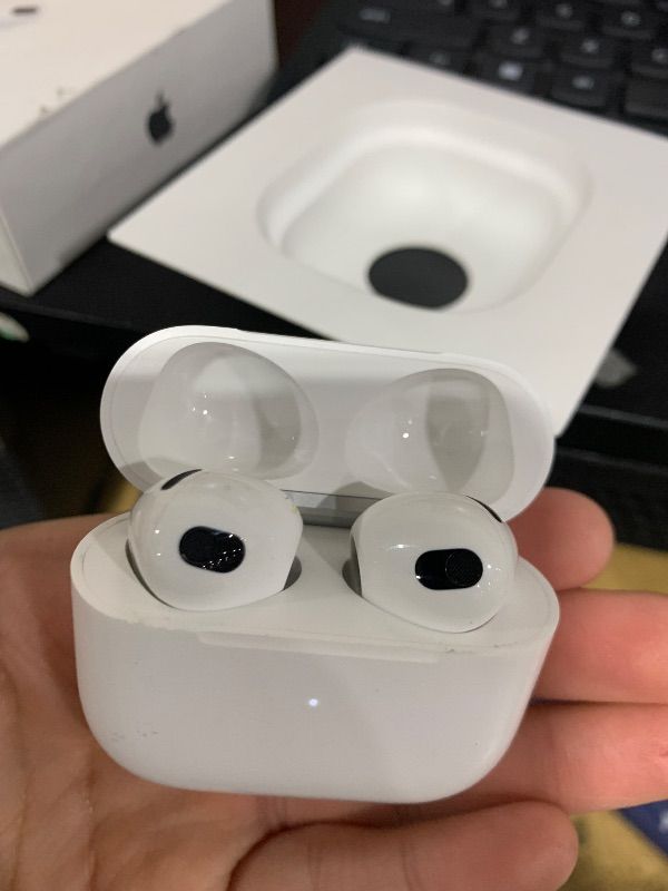 Photo 1 of major damage-------------------Apple AirPods (3rd Generation) Wireless Ear Buds, Bluetooth Headphones, Personalized Spatial Audio, Sweat and Water Resistant, Lightning Charging Case Included, Up to 30 Hours of Battery Life