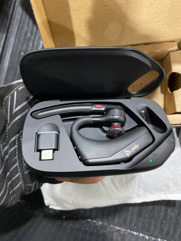 Photo 1 of Poly Voyager Legend 50 UC Bluetooth Headset with Charging Case - 4 Noise-Canceling Mics, AI NoiseBlockAI & WindSmart Tech - Bluetooth Headphones with Mic, Smart Call Controls, All-Day Comfort
