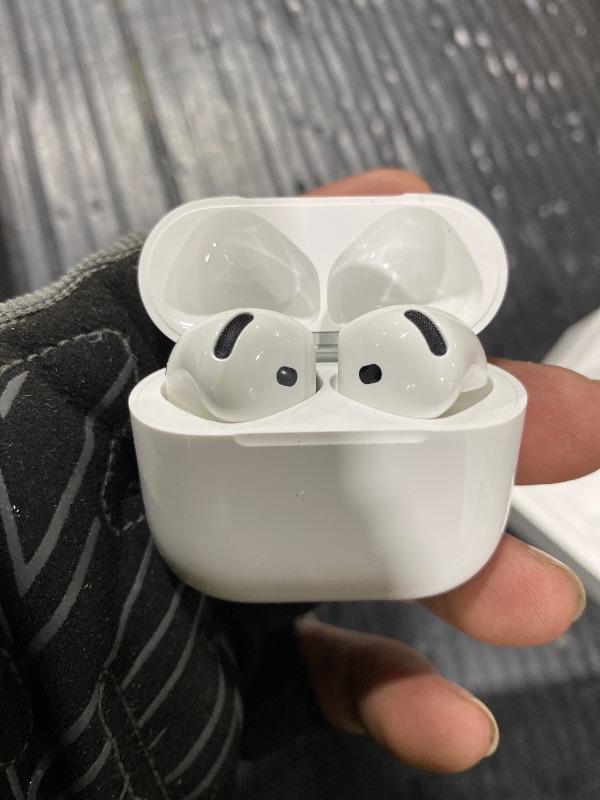 Photo 1 of Apple AirPods 4 Wireless Earbuds, Bluetooth Headphones, with Active Noise Cancellation, Adaptive, Transparency Mode, Personalized Spatial Audio, USB-C Charging Case, Wireless Charging, H2 Chip