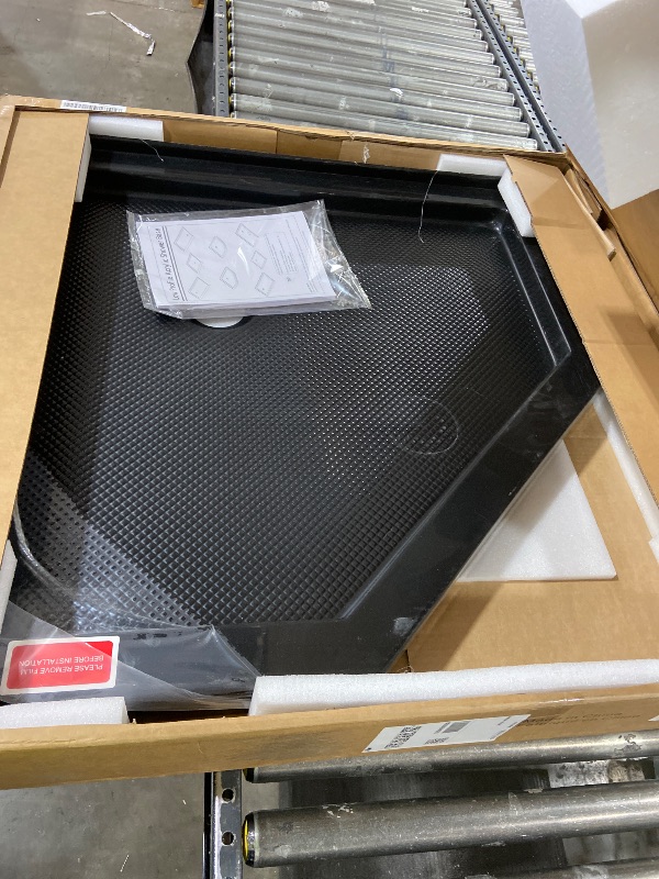 Photo 1 of DreamLine SlimLine 34 in. D x 54 in. W x 2 3/4 in. H Center Drain Single Threshold Shower DLT-1134540