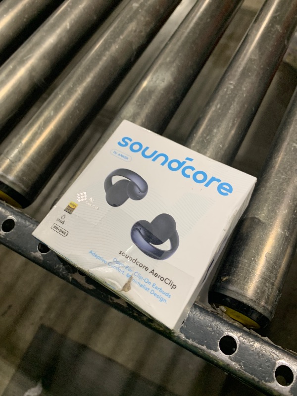Photo 1 of Soundcore AeroClip by Anker, Open-Ear Earbuds, Clip-On Headphones, Adaptive Comfort, Clear Calls with 4 Mics and AI, Stable Fit, 12mm Drivers for Powerful Bass, Hi-Res, Open-Ring Design