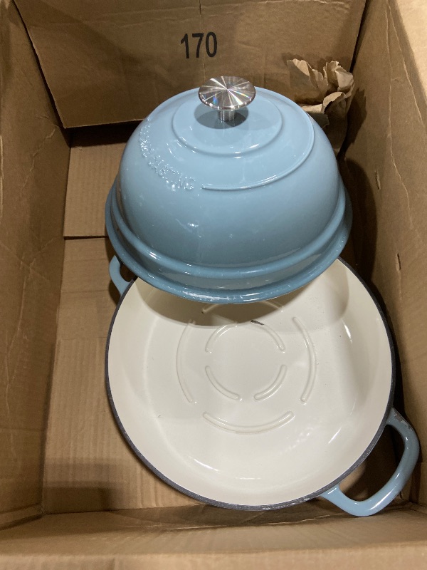 Photo 1 of edging cast iron pot