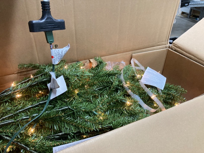 Photo 1 of *Plug is bent slightly but works* National Tree Company 12 ft Pre-Lit Dunhill Fir Artificial Christmas Tree, 1,500 Clear Lights, 7,794 Tips, Includes Stand, Green
