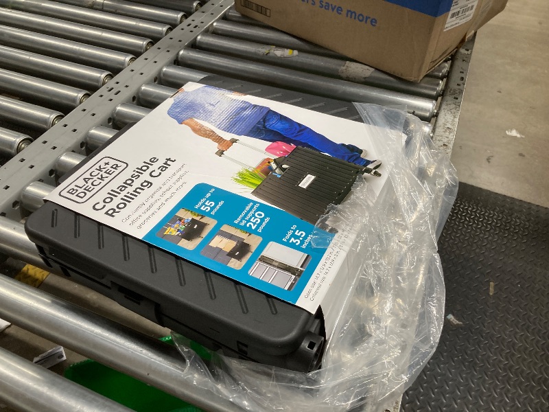 Photo 1 of *2 Wheels Missing* BLACK+DECKER Small Collapsible Pack N Roll Folding Utility Cart with Lid, 4 Wheels, Adjustable Handle, Portable, Black