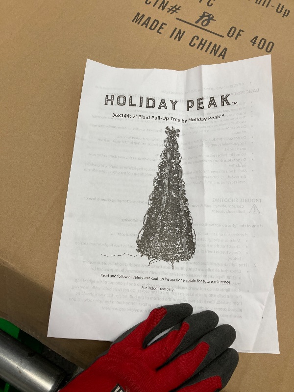 Photo 1 of *Small scratches* Holiday Peak Pull-Up Christmas Tree, Pre-Lit and Fully Decorated, 7’