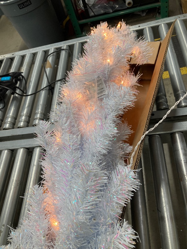 Photo 1 of ***DAMAGE -SELLING AS IS***  National Tree Company 4 ft Pre-Lit Mini Artificial Christmas Tree, White Iridescent Tinsel, 70 Clear Lights, 110 Tips, Includes Stand