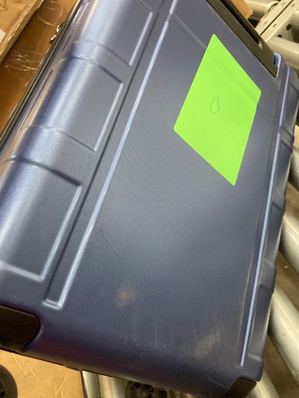 Photo 1 of 
USED ??BLUE SUITCASE WITH SOME DAMAGE