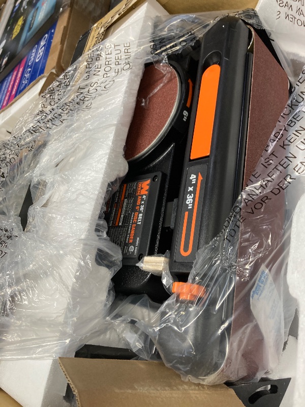 Photo 1 of **It's used and missing a part, and it's unknown if it works 100%****WEN Benchtop Belt and Disc Sander with 4 x 36 in. Belt, 6 in. Disc and Cast Iron Base (6502T)