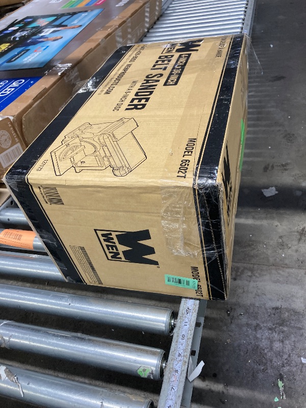 Photo 1 of **It's used and missing a part, and it's unknown if it works 100%****WEN Benchtop Belt and Disc Sander with 4 x 36 in. Belt, 6 in. Disc and Cast Iron Base (6502T)