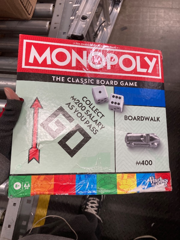 Photo 1 of **NEW WITH DAMAGED PACKAGE***Monopoly Board Game | Classic Game with Storage Tray and Larger Tokens | Ages 8+ | 2 to 6 Players | Family Games for Kids and Adults | Kids