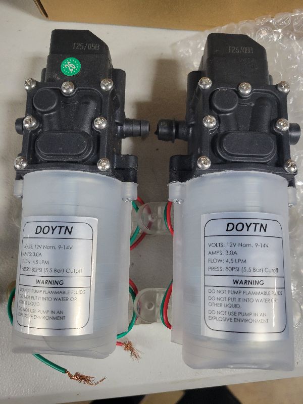 Photo 1 of 12V DC Fresh Water Pump with 2 Hose Clamp 12 Volt Diaphragm Pump Self Priming Sprayer Pump with Pressure Switch 4.5 L/Min 1.2 GPM 80 PSI Adjustable for RV Camper Marine Boat La Transparent color (2)