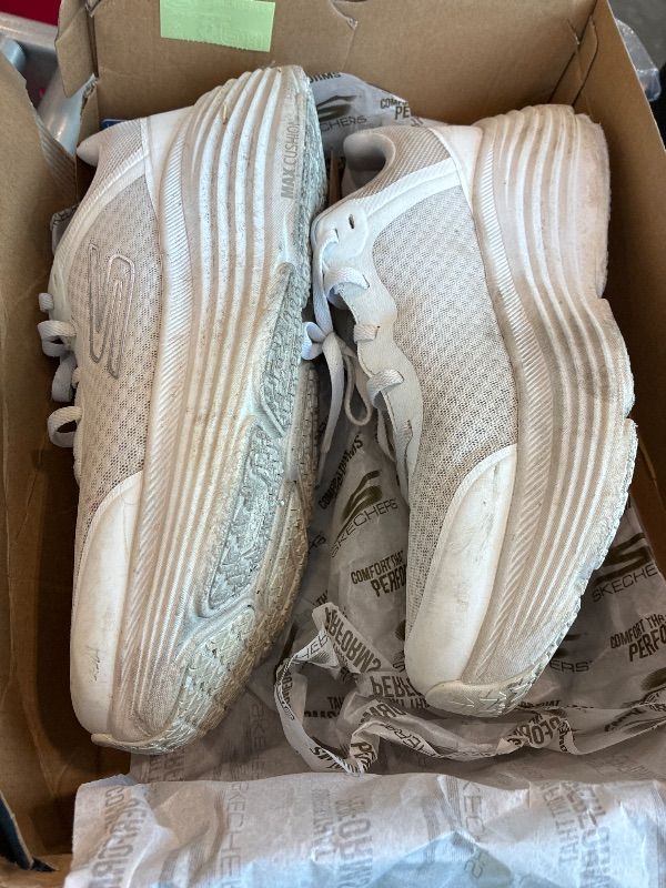 Photo 1 of **MAJOR DAMAGE - See clerk notes**
Skechers Men's Max Cushioning Endeavour Sneaker, Black/White, 10.5