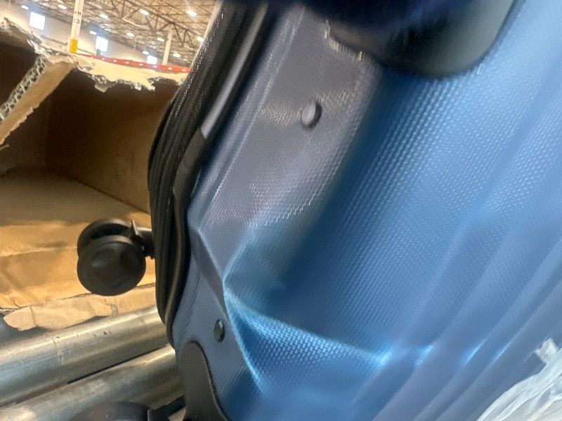 Photo 1 of **MINOR DAMAGE**Amazon Basics 21" Hardside Carry-On Luggage, Hardshell Suitcase With Wheels, Expandable For Up to 25% More Space, With Scratch-Resistant Surface, Four Multi-directional Wheels, Navy Blue