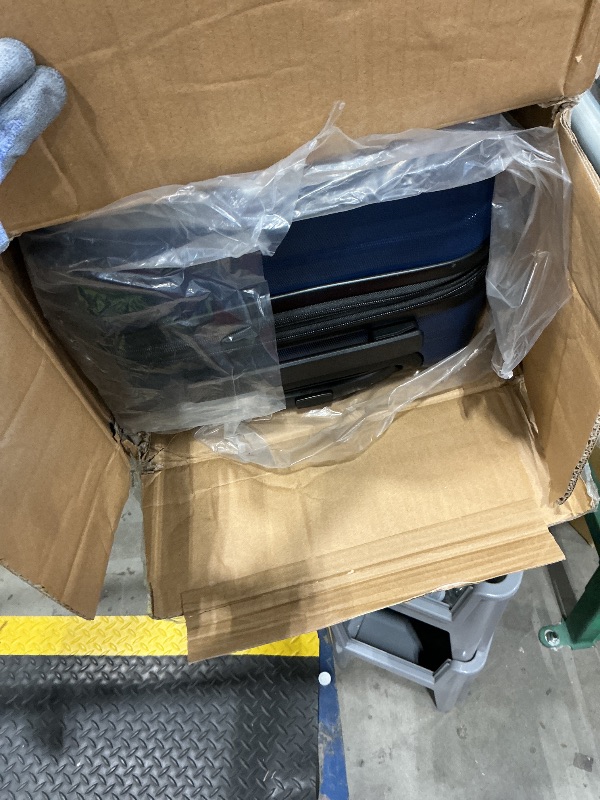 Photo 1 of **MINOR DAMAGE**Amazon Basics 21" Hardside Carry-On Luggage, Hardshell Suitcase With Wheels, Expandable For Up to 25% More Space, With Scratch-Resistant Surface, Four Multi-directional Wheels, Navy Blue