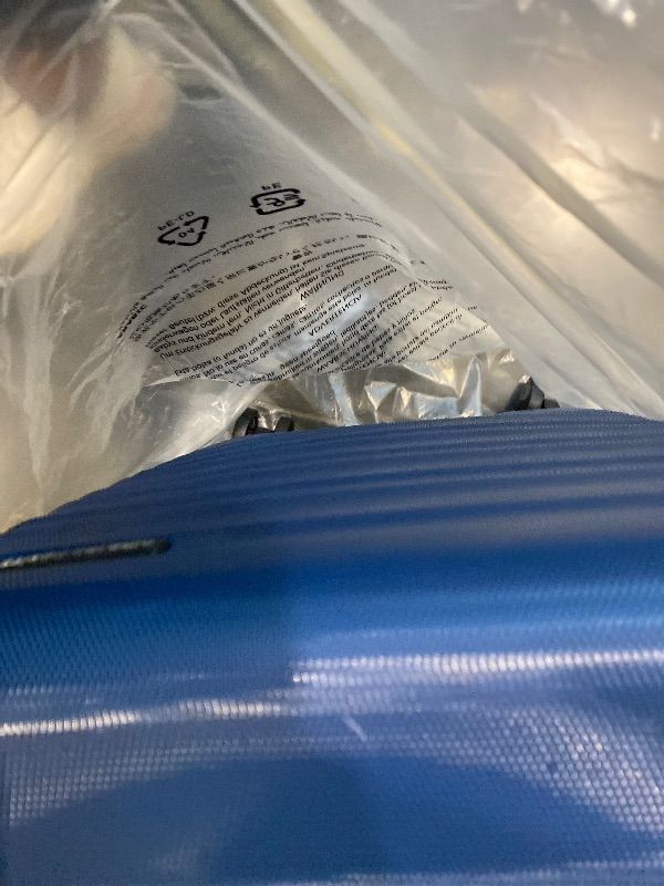 Photo 1 of **MINOR DAMAGE**Amazon Basics 21" Hardside Carry-On Luggage, Hardshell Suitcase With Wheels, Expandable For Up to 25% More Space, With Scratch-Resistant Surface, Four Multi-directional Wheels, Navy Blue