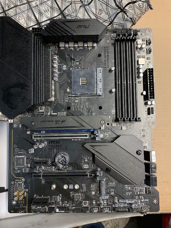 Photo 1 of **FOR PARTS ONLY**
MSI MPG AMD B550 Gaming Plus Socket AM4 ATX DDR4-SDRAM Motherboard