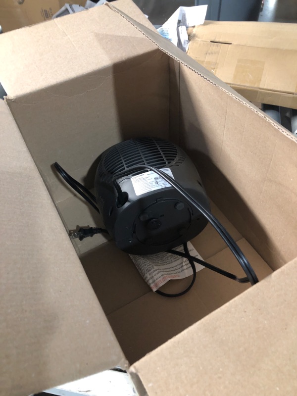 Photo 1 of Amazon Basics Ceramic Space Heater, Portable Indoor Heating Solution, With Overheat and Tip-Over Protection, Thermostat, Non-Oscillating, 1500W, 7.52"D x 6.34"W x 9.45"H, Black