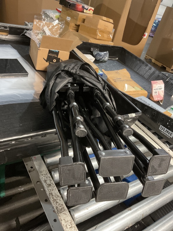 Photo 1 of **** photo stock for reference***** Amazon Basics Portable Camping Chair with 4-Can Cooler, Side Pocket, Cup Holder, and Carry Bag, Collapsible for Camping, Tailgates, Beach, and Sports, X-Large, Padded, Black