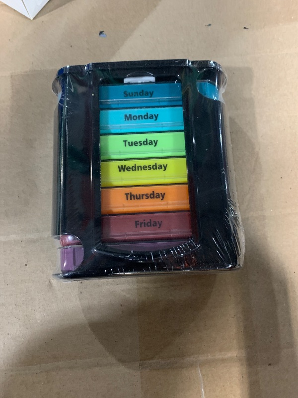 Photo 1 of ***LIKE NEW OPEN BOX*** ***FACTORY SEALED***Stackable Daily Pill Organizer - (4 Times a Day) Weekly Medication Reminder - Premium Weekly AM/PM Pill Box with 7 Individual Stacking Cases, a Everyday Medicine Organizer for Vitamins