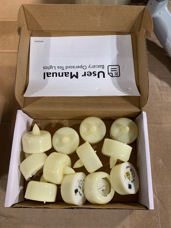 Photo 1 of ***DAMAGED - SEE NOTES/PICTURES*** *** ONE OF THE CANDLES ARE CRACKED OPEN ON THE TOP PART *** Amagic 12/24/50/100/150 Pack Flameless LED Tea Lights Candles Battery Operated, Electric Fake Tealight Candles for Votive, Halloween, Christmas, Home Decor, Wed