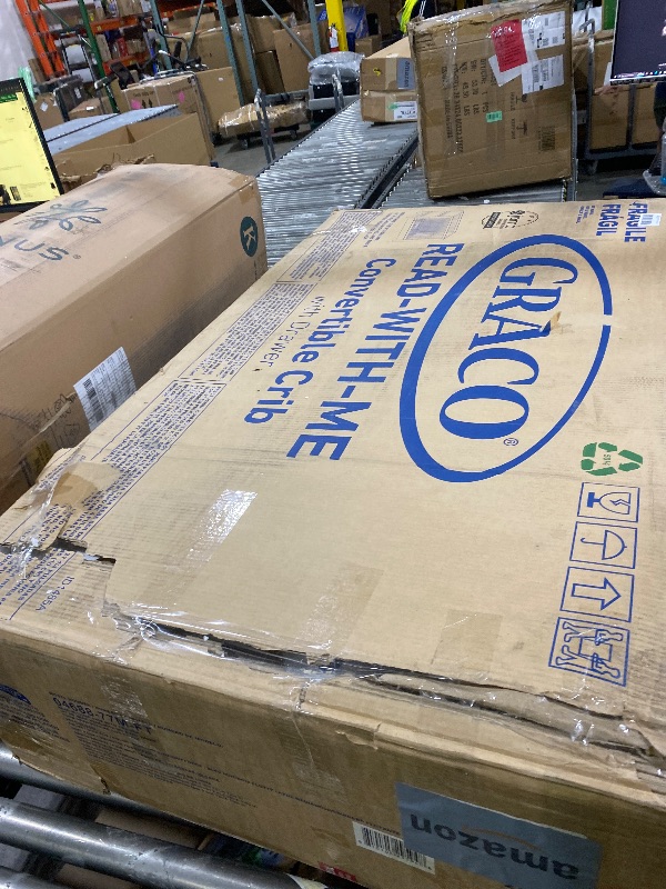 Photo 1 of Graco Read-with-Me 4-in-1 Convertible Crib with Drawer (Midnight Blue with Driftwood) - GREENGUARD Gold Certified Converts to Toddler Bed, Daybed, and Functional Bookshelves