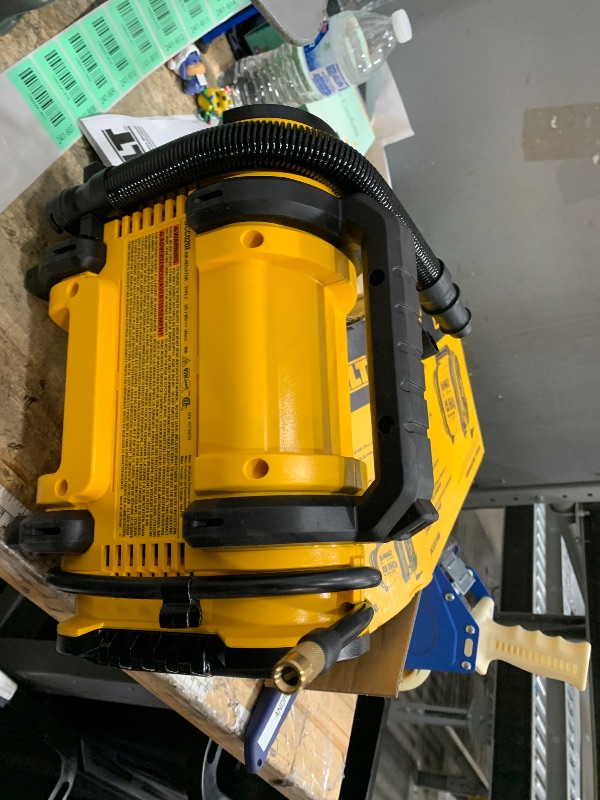 Photo 1 of DEWALT Tire Inflator Portable Air Compressor 20V MAX, Car Air Pump with Automatic Shut Off, LED Light, Tool Only (DCC020IB)