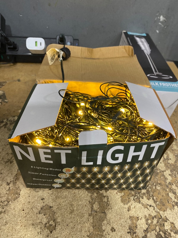 Photo 1 of *USED*OYCBUZO 360LED Net Lights, 21ft x 5ft Connectable Christmas Outdoor Mesh Lights with Timer & 8 Lighting Modes, Waterproof String Light Plug in for Xmas Tree Bushes Garden Holiday Party - Warm White