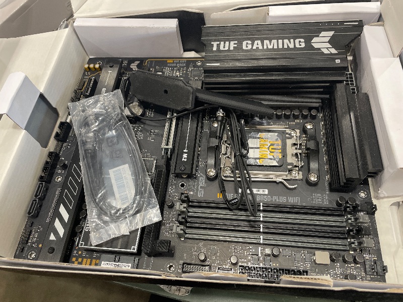 Photo 1 of * FOR PARTS * ASUS TUF Gaming B850-PLUS WiFi AMD AM5 B850 ATX Motherboard, 14+2+1 80A Stages, AI Ready, DDR5, PCIe 5.0, 3X M.2, Wi-Fi 7, 2.5Gb LAN, DisplayPort, HDMI™, USB 10Gbps & 20Gbps Type-C®, BIOS Flashback™