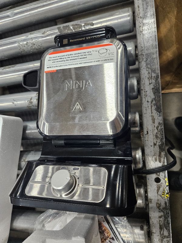 Photo 1 of ** For parts only does not power on ** Ninja BW1001 NeverStick PRO Belgian Waffle Maker, Vertical Design, 5 Shade Settings, with Precision-Pour Cup & Chef-curated Recipe Guide, Black & Silver