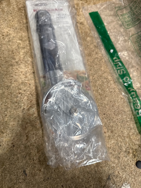 Photo 1 of KitchenAid Classic Pizza Wheel with Sharp Blade For Cutting Through Crusts, Pies and More, Built In Finger Guard for Safety and Comfort Grip to Protect Fingers, Dishwasher Safe, 9-Inch, Black