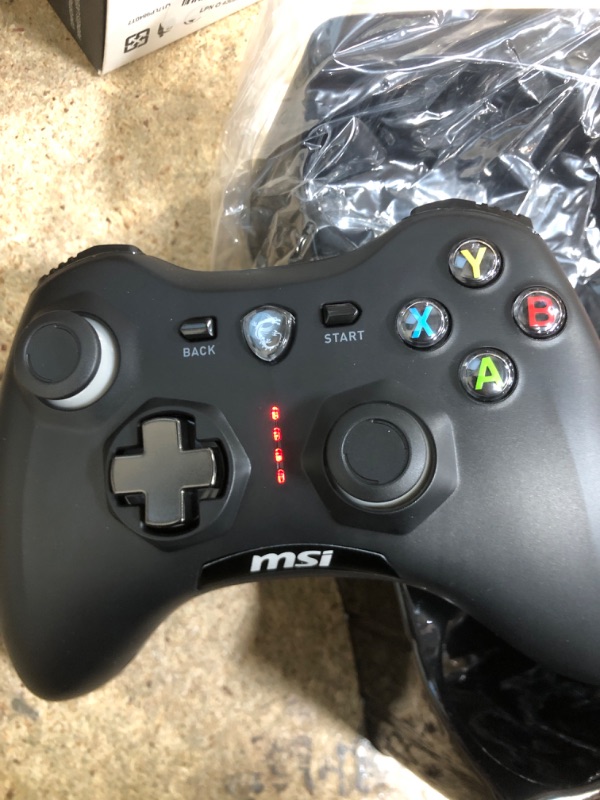 Photo 1 of MSI Force GC30V2 Wireless Gaming Controller, Dual Vibration Motors, Dual Connection Modes, Interchangable D-Pads, Compatible with PC & Android, Black