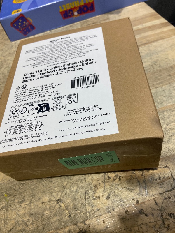 Photo 1 of Amazon Basics 24 Medium Pocket Over-the-Door Hanging Shoe Organizer, Light Grey