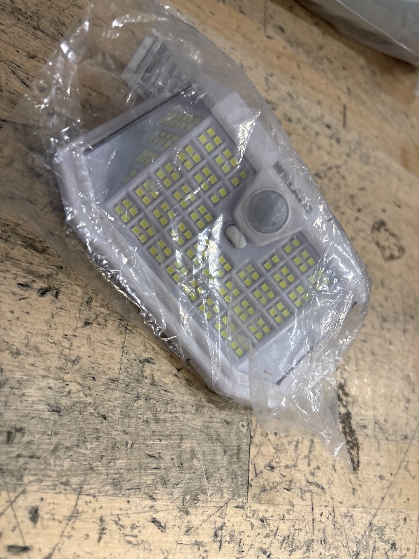 Photo 1 of ****UNTESTED/ PARTIAL SET ONLY 1**** WELALO Solar Motion Sensor Lights Outdoor, [3 Modes/ 1 Pack/188 LED] 270° Wide Angle Lighting, Security Solar Powered Wall Lights, IP65 Waterproof Flood Lights for Fence Porch Yard Patio(White)