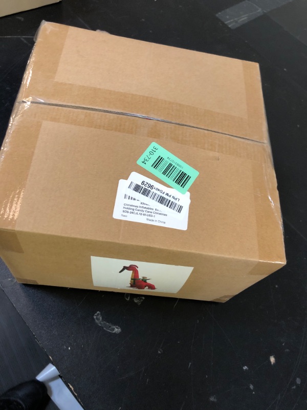 Photo 1 of 12 Ft Ht x 14 Ft L Giant Christmas Inflatables Santa Elf Ride Dinosaur Holding Candy Cane Christmas Blow Up Yard Decorations Built-in LEDs Christmas Decorations Outdoor Party Holiday Xmas Decor Lawn