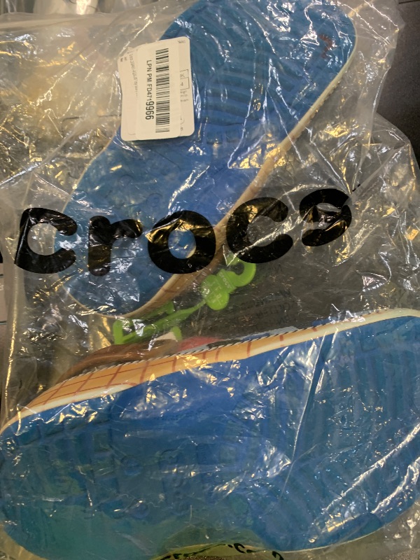 Photo 1 of Crocs Kids Toy Story Classic Clogs for Kids – Round Toe Design – Pivot Heel Strap – Thermoplastic Make Blue Jean 4 Big Kid M