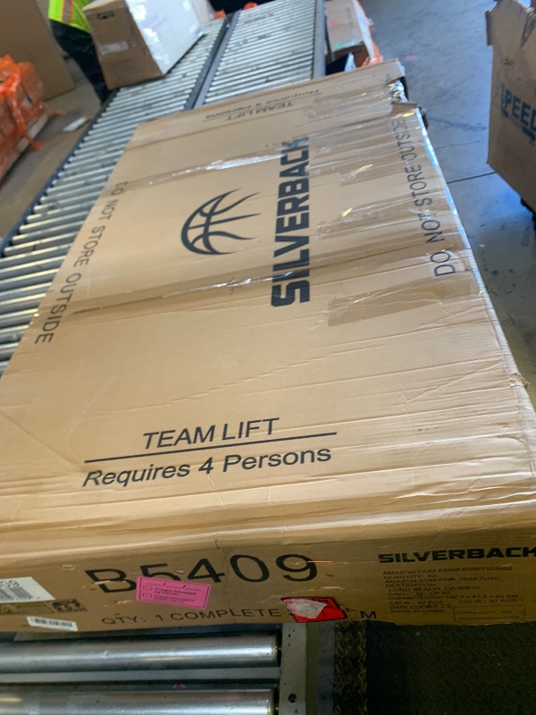 Photo 1 of Silverback Ghost Basketball Goal with 60-Inch Tinted Tempered Glass Backboard