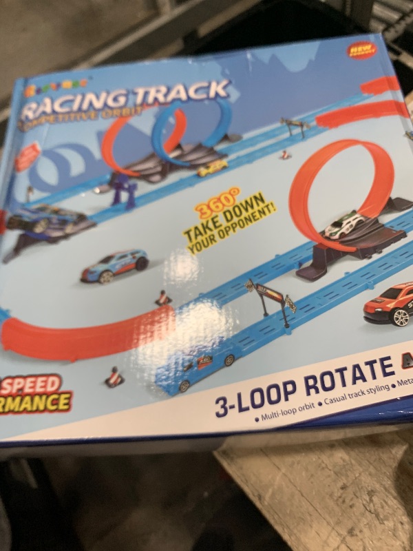Photo 1 of ?Slot Car Race Track Sets with 360° Thrill Loops & 4 High-Speed Cars, 64 Pcs Large Flexible Racing Track for Kids Ages 3-5 4-8 8-12, Race Car Toys Gift for Boys Girls Birthday Christmas
