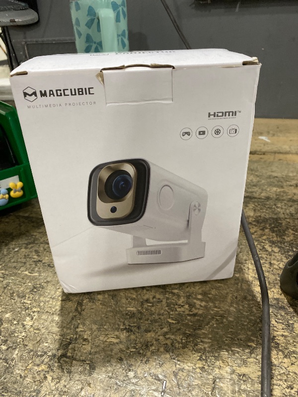 Photo 1 of ?Auto Focus&1080P?Magcubic Mini Smart Projector with 4K Support, Portable Projector with Wifi and Bluetooth, 5W Speaker, Built in Apps, Voice Control, Outdoor Movie Projector