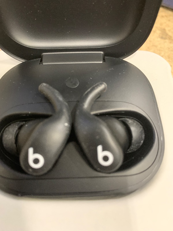 Photo 1 of ****************Right earbud doesn’t work***********
Beats Powerbeats Fit - Wireless Noise Cancelling Workout Earbuds with Secure-Fit Wingtips, Up to 30-Hour Battery Life, Sweat & Water Resistant, Apple & Android Compatible - Jet Black