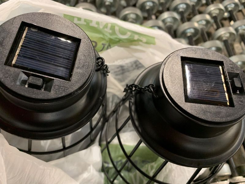 Photo 1 of ***NOT FUNCTIONAL, SELLING FOR PARTS, FINAL SALE*** Solar Lantern 2 Packs Outdoor Hanging Light Waterproof Solar Table Lamp with Warm White LED Edison Bulb for Garden Patio Yard, Small Lantern, Black***NOT FUNCTIONAL, SELLING FOR PARTS, FINAL SALE***