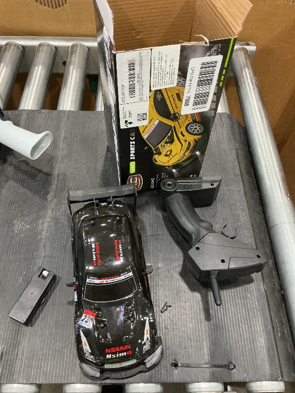 Photo 1 of **MISSING PARTS/check clerk comments**
HTURCCOP 1:20 RC Drift Car 2.4GHz 4WD High Speed Drift Remote Control Cars Vehicle with LED Lights and Drifting Tires Batteries x2 Racing Sport Toy Cars for Adults Boys Girls Kids (Black 1:20)
