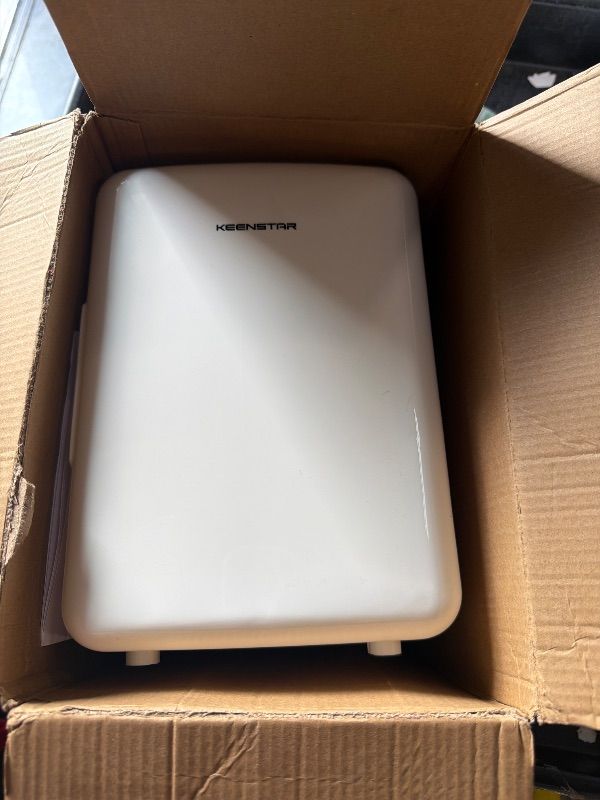 Photo 1 of **MAJOR DAMAGED/check clerk comments**

4L Mini Fridge for Skincare & Food, 110V/12V Cooler & Warmer, Portable Refrigerator for Bedroom, Office, Car, Dorm - Ultra Quiet, Energy Efficient, Dual Use for Breast Milk, Cosmetics, Snacks (White)